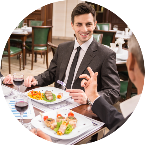 People having work lunch in a boardroom